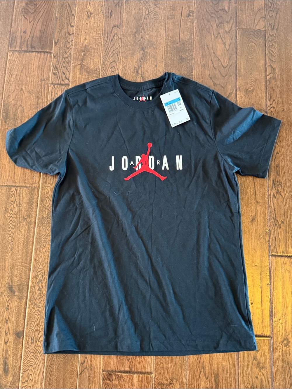 Jordan Black Short Sleeve Tee with Red Jumpman and White JORDAN Text